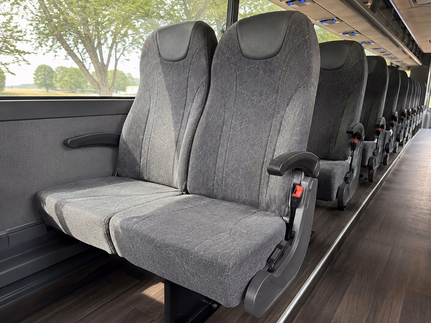 how trip distance and duration affect charter bus rental rates in meridian